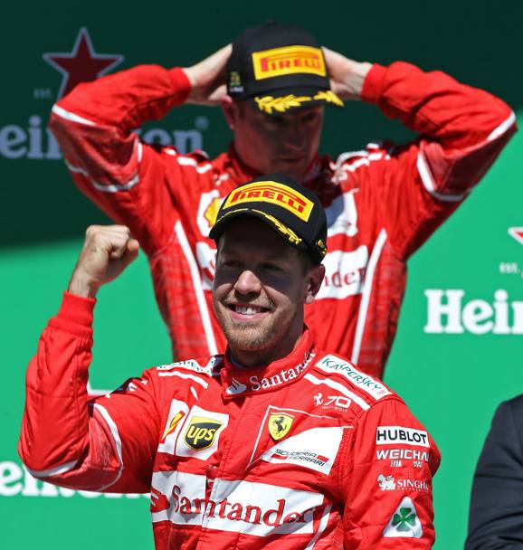 Vettel e Raikkonen sul podio. Reuters
